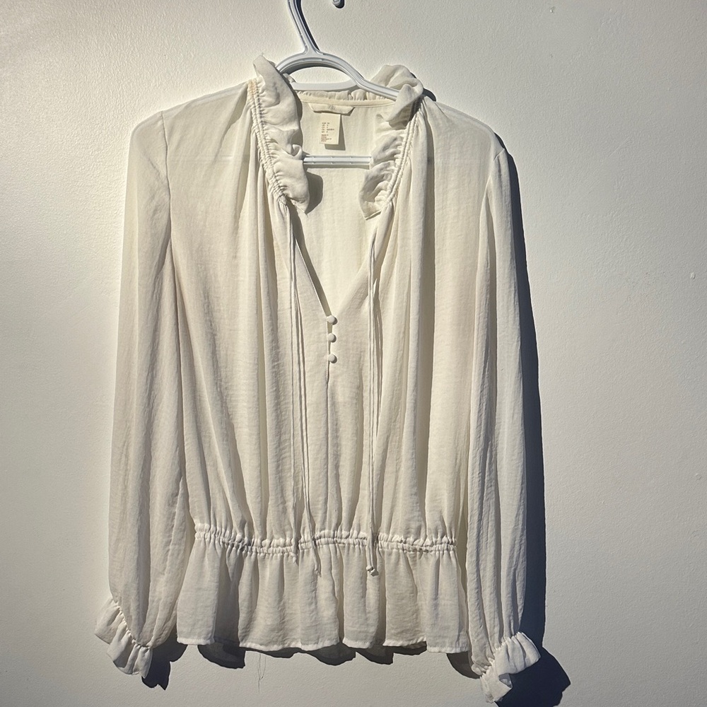 Elegant White Ruffled Blouse